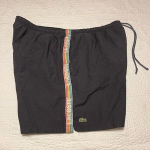 Black XL Lacoste swimsuit with accents color.